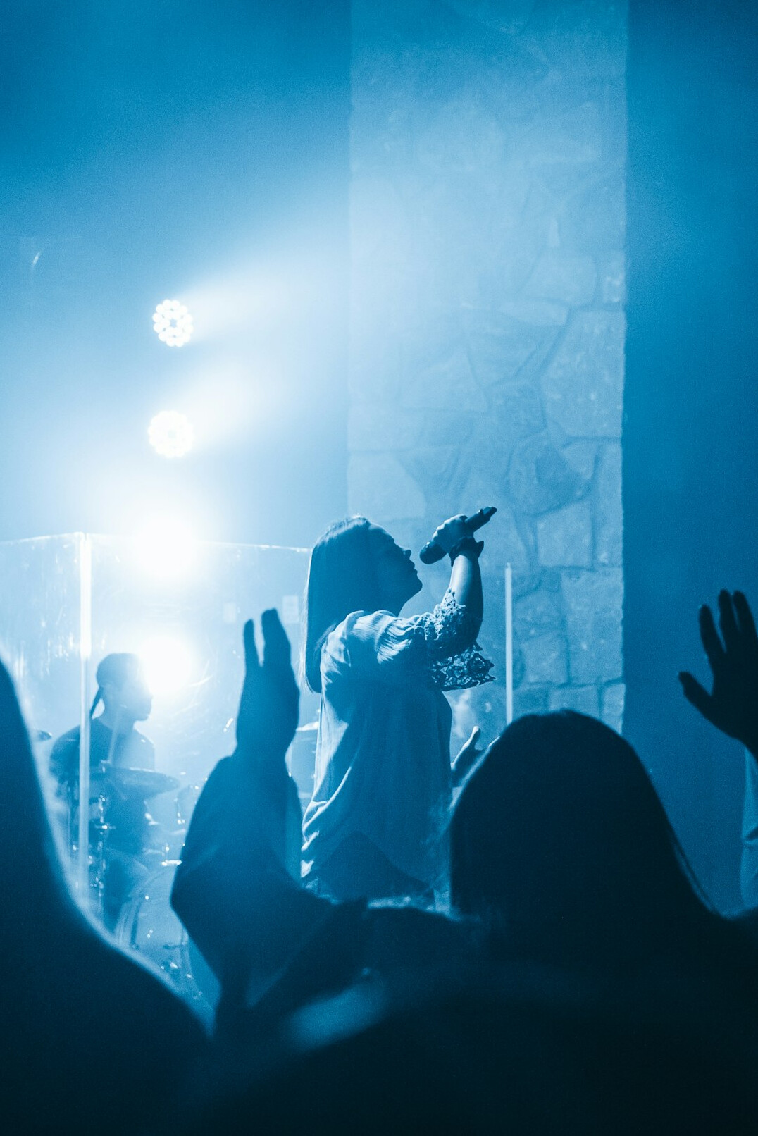 singer performing on stage
