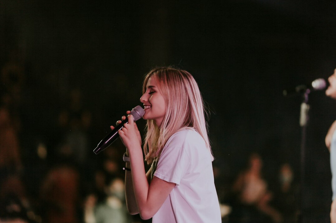 singer on stage performing