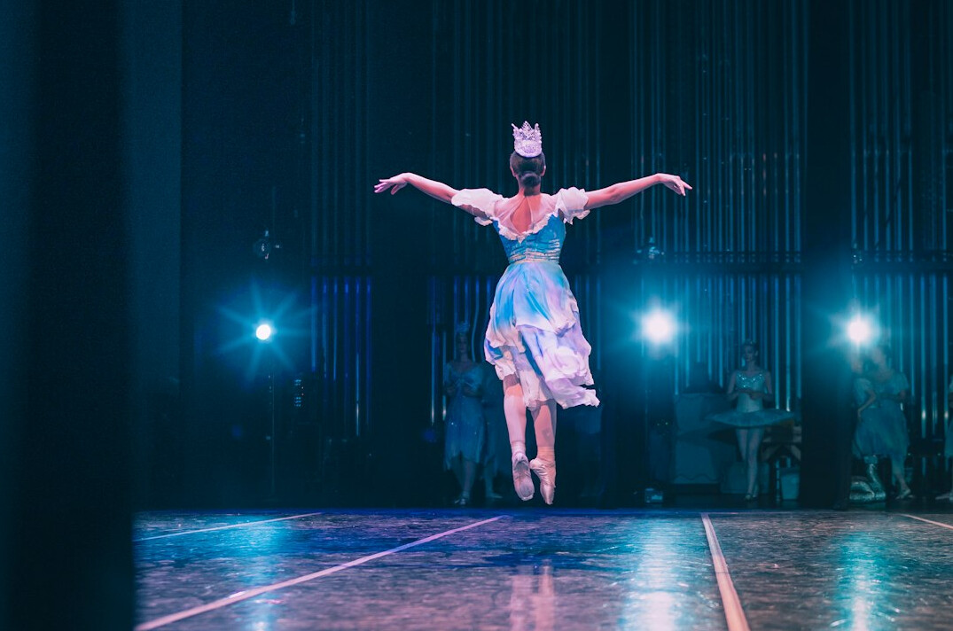 actress on stage performing
